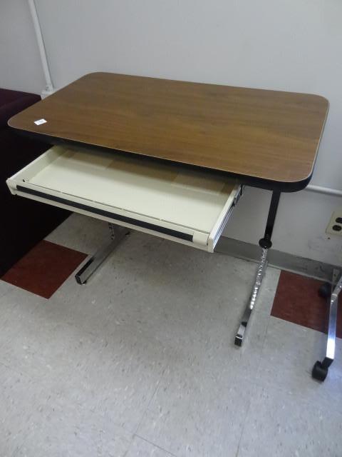 lot 68 image: 36 x 20 adjustable height table...