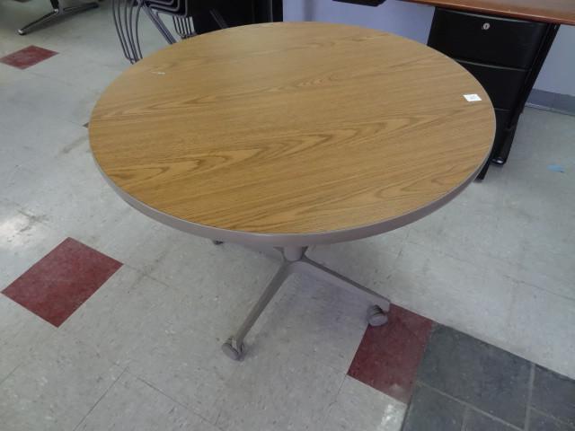 lot 72 image: 36" round table on wheels...