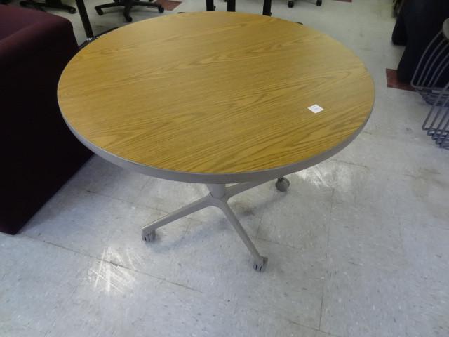 lot 75 image: 36" round table on wheels...