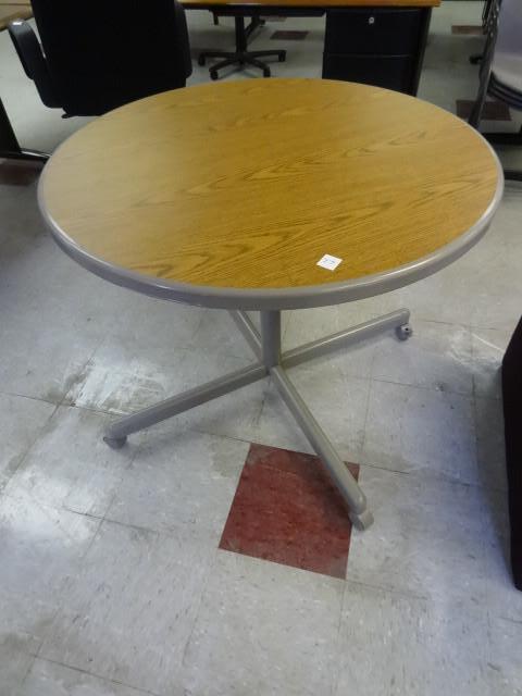 lot 77 image: 36" round table on wheels...