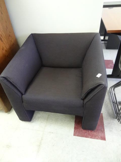 lot 82 image: Cushioned waiting room chair...