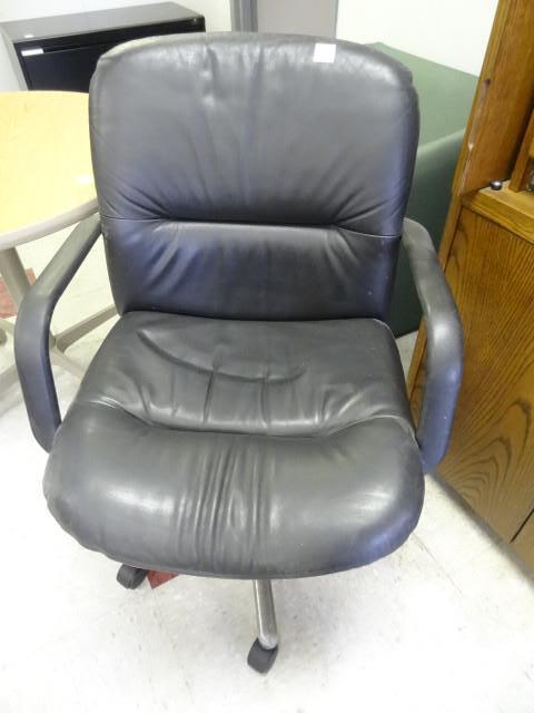 lot 86 image: Office chair on wheels...