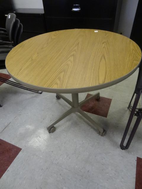 lot 93 image: 36" round table on wheels...