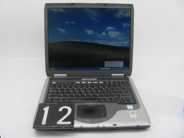 lot 12 image: HP presario 2200 laptop computer. T...