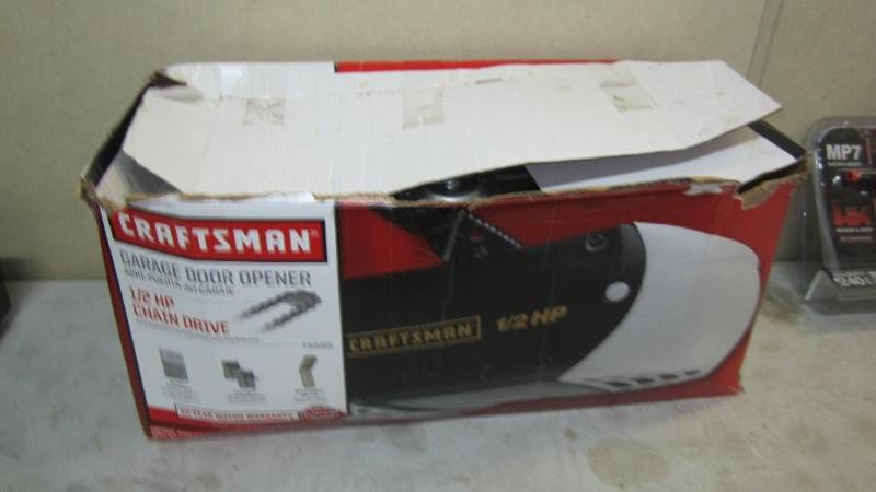 lot 31 image: Craftsman 12hp garage door opener,...