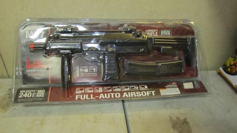 lot 32 image: HK BB gun...