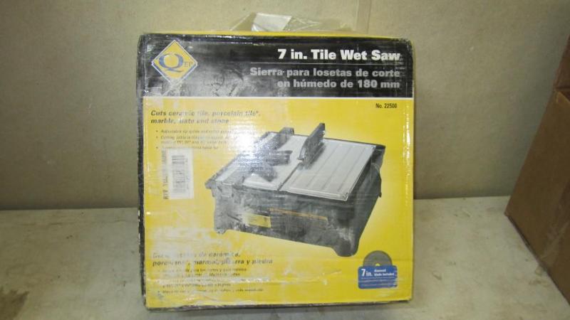 lot 54 image: 7 in tile saw...