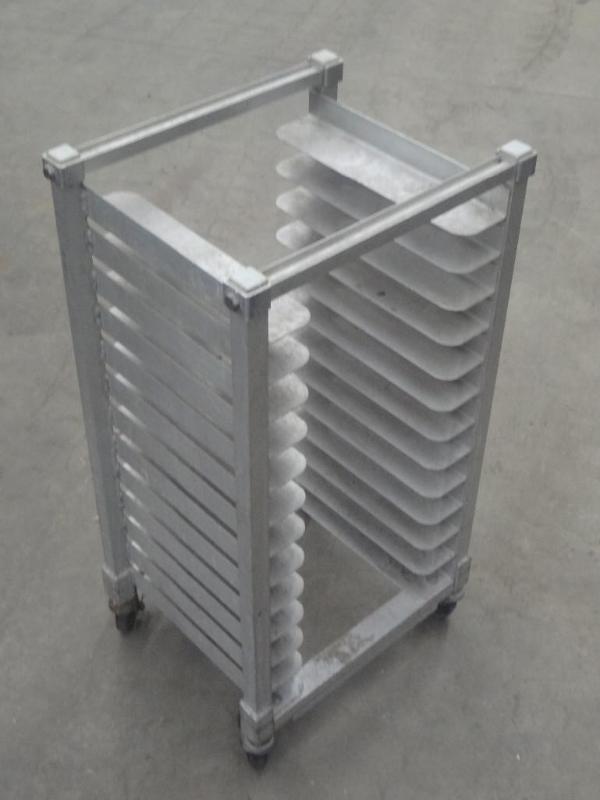 lot 53 image: New Age Rolling Aluminum Tray Rack...