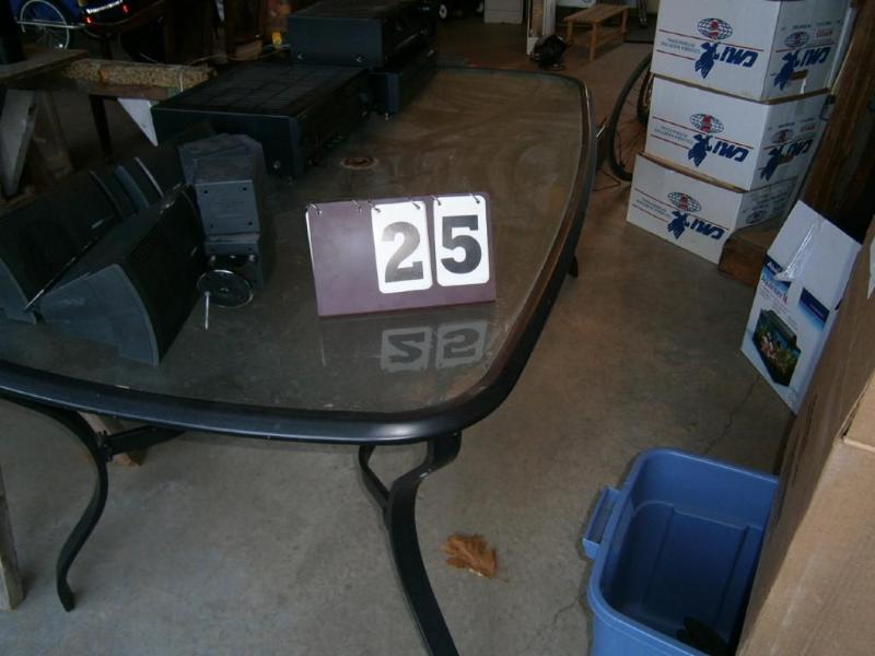 6 ft. glass top patio table....
