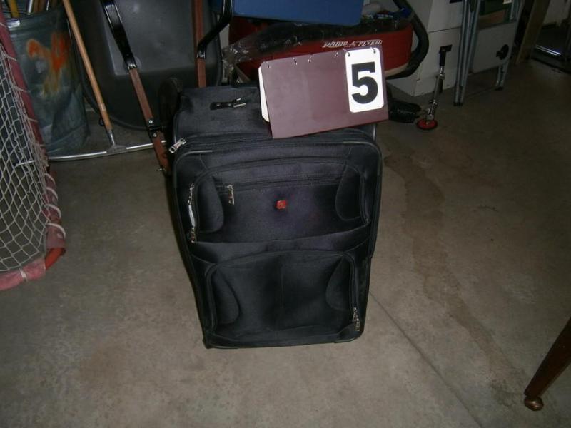 Suitcase, missing one wheel....