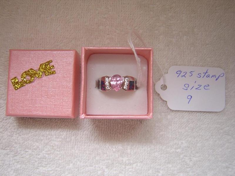 lot 20 image: Amazing silver ring with pink stone...