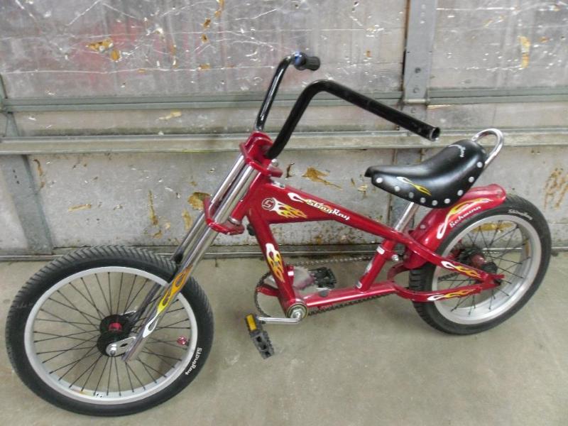 lot 7 image: Boys Schwinn Sting Ray chopper bike...