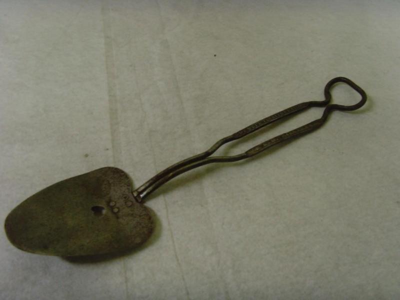 lot 32 image: 1930s Bottle Opener & Cake Server