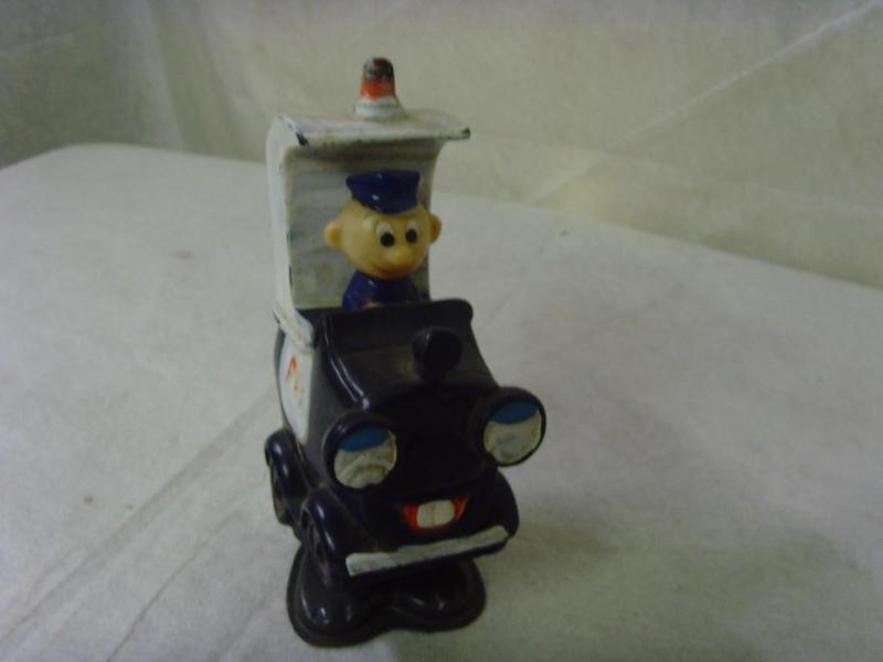 lot 34 image: Windup Bouncing Policeman