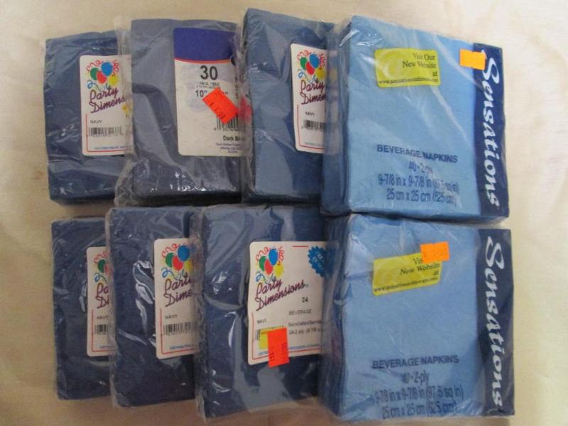 Lot of 8 packages of blue napkins. ...