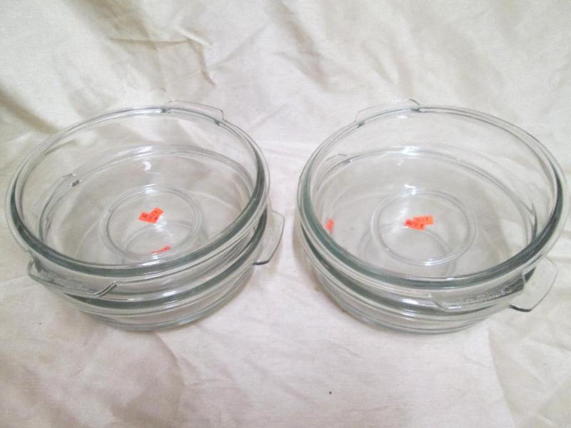 Lot of 4 glass casserole dishes. Ne...