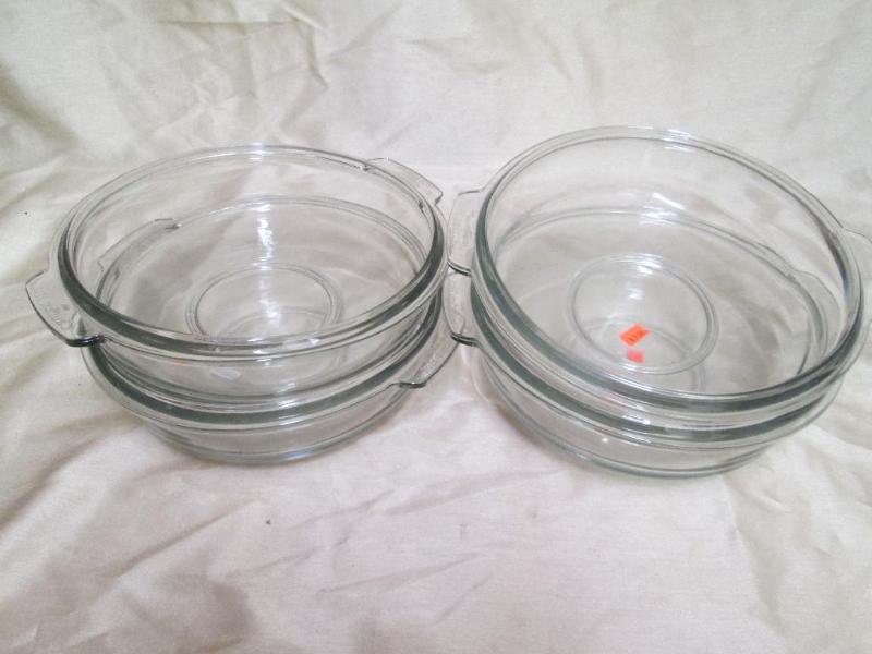 Lot of 4 glass casserole dishes. Ne...