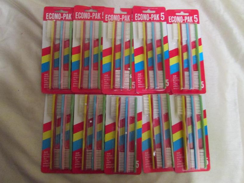 Lot of 10 packages of toothbrushes....