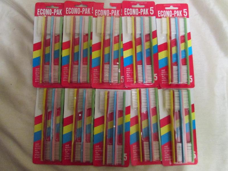 Lot of 10 packages of toothbrushes....
