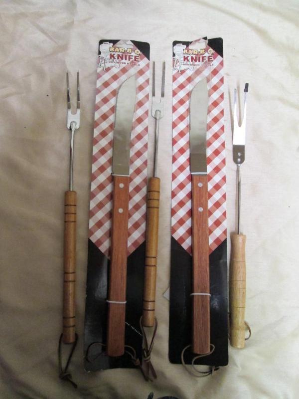 Lot of new barbeque forks and knive...
