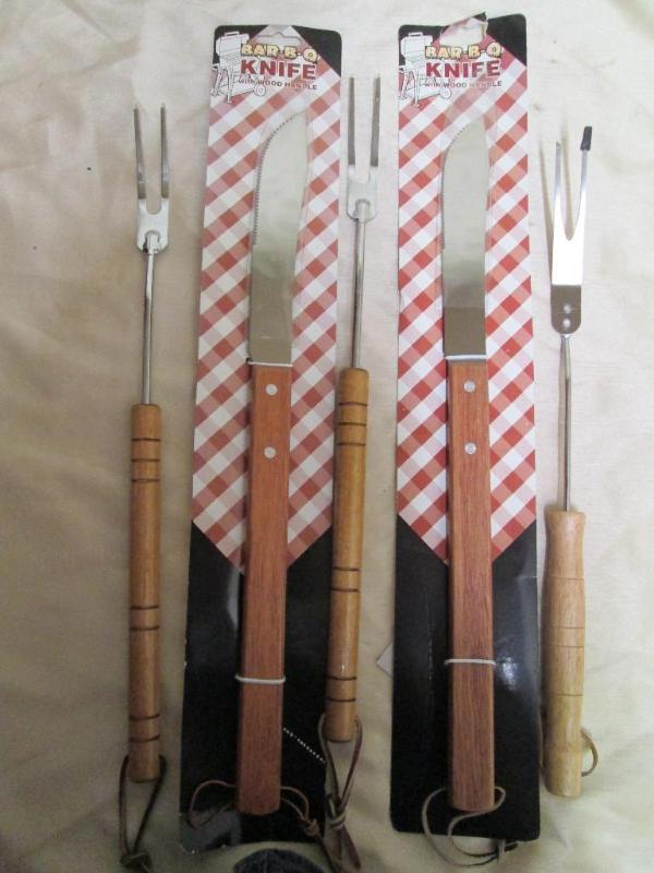 Lot of new barbeque forks and knive...