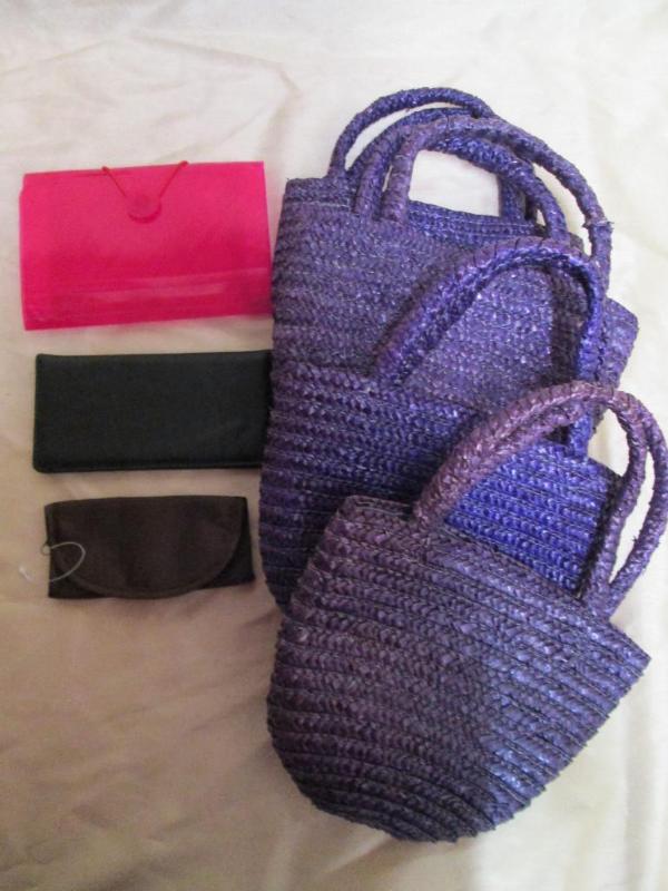 Lot of new handbags and clutches....