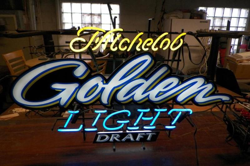 lot 12 image: Mich Golden Neon Sign
