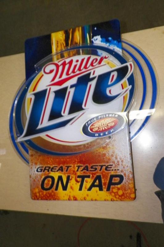 lot 20 image: Miller Lite Tin Sign