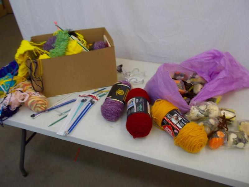 lot 29 image: 2 boxes containing yarn, knitting n...
