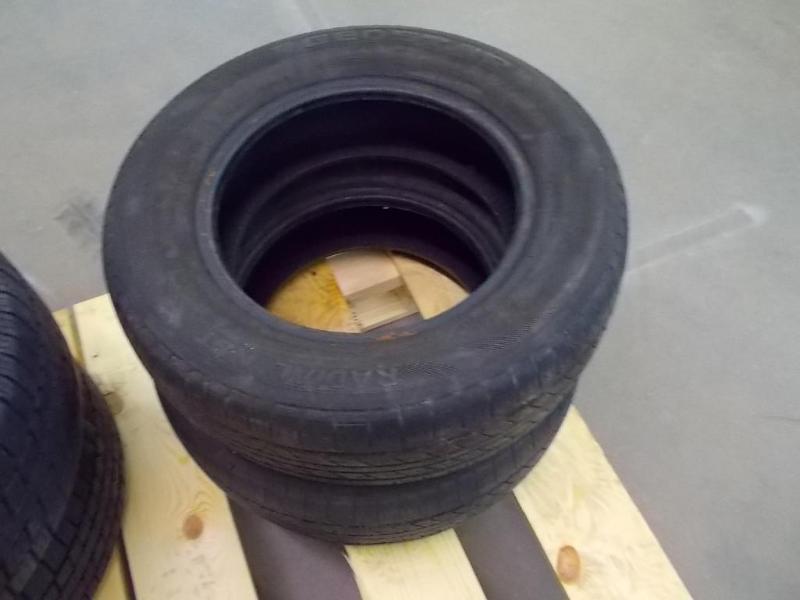 lot 30 image: a pair of Geostar radial NST tires....