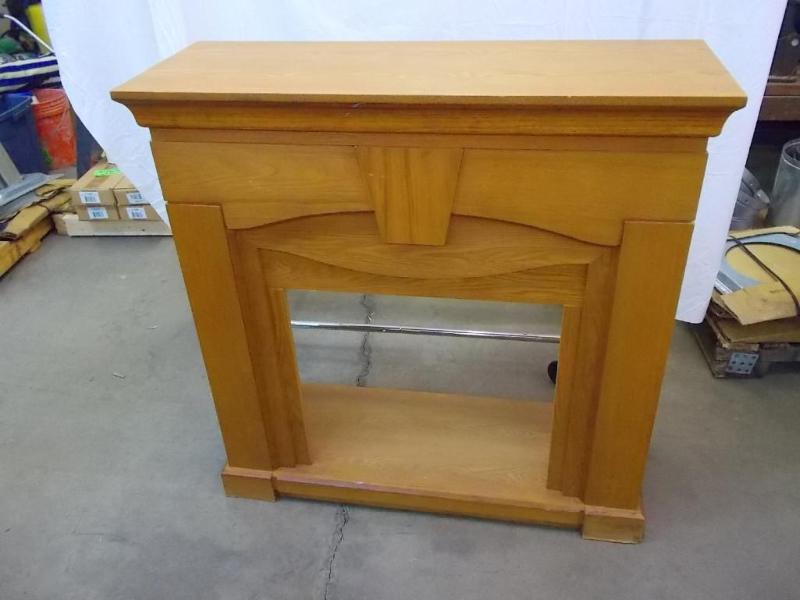 lot 5 image: Fireplace mantle with oak finish. T...