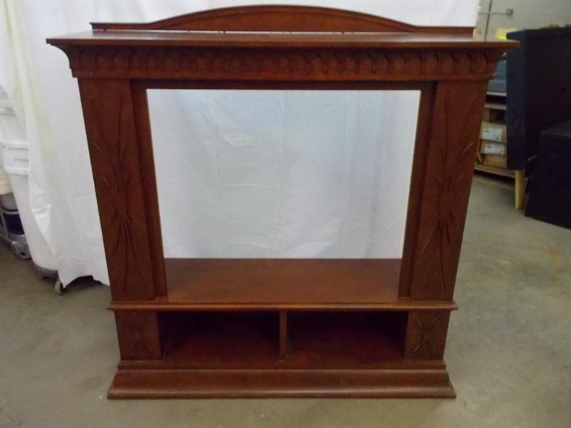 lot 6 image: Fireplace mantle with mahogany fini...
