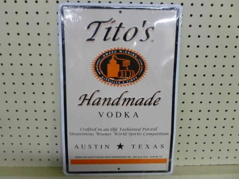 Titos Handmade Vodka embossed meta...