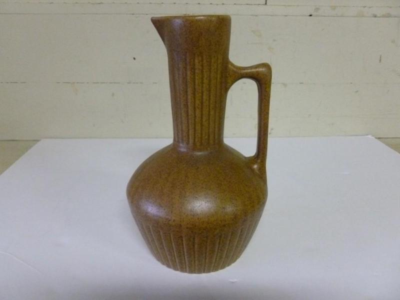 Large handled pottery vase that mea...