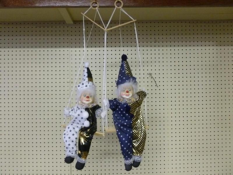 Lot of two swinging porcelain clown...