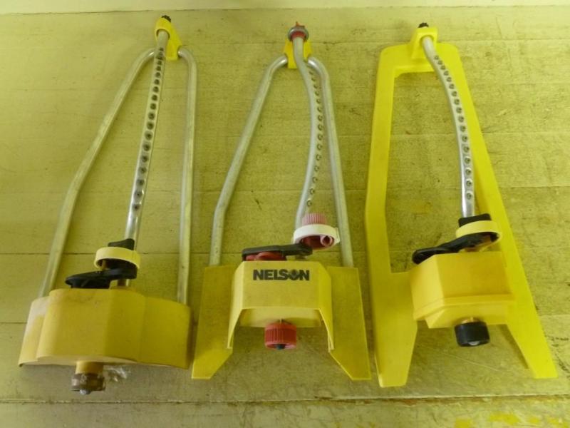 Lot of three large lawn sprinklers,...