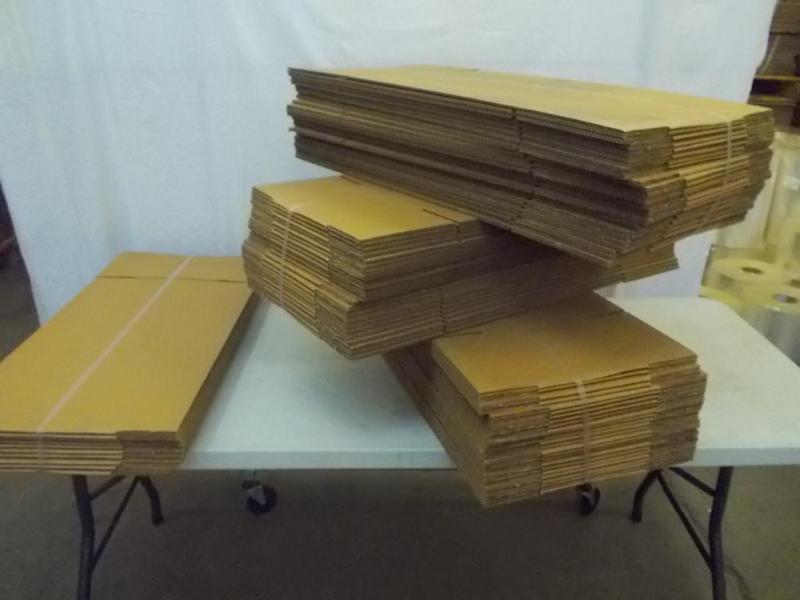 Cardboard boxes. 3 bundles of 25, 1...