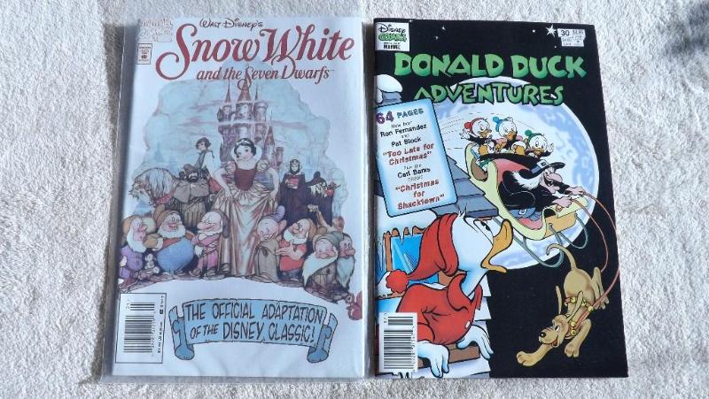 2 Marvel  Disney Comic Books...