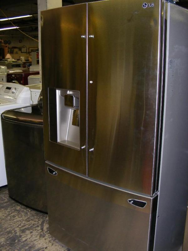 lot 1 image: LG Refrigerator Model # LFX31945ST