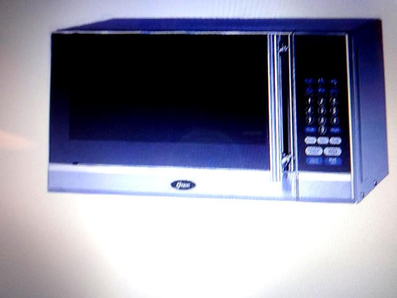 OSTER 0.7 CU.FT. 700 WATT MICRWAVE ...