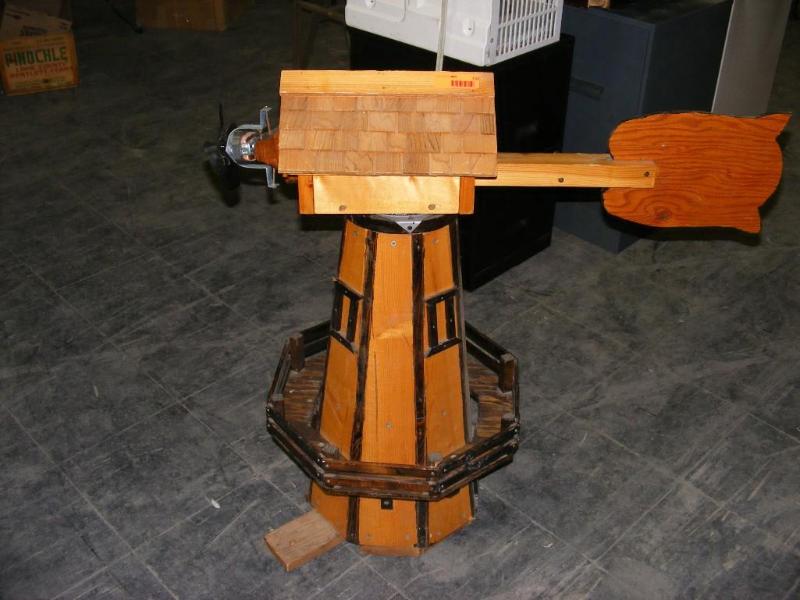 lot 118 image: Garden Windmill  has a little moto...