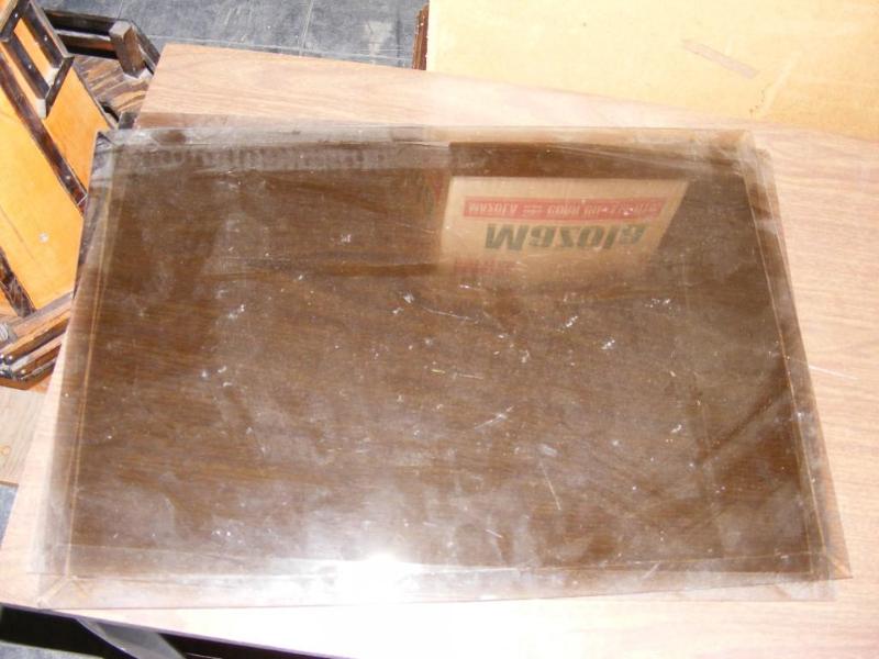 lot 202 image: Two panes of beveled glass, smoke c...