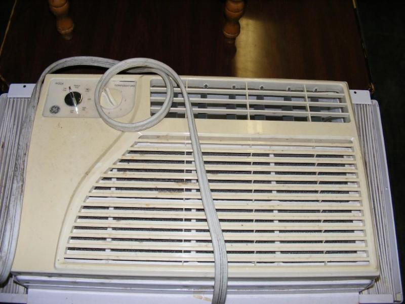lot 203 image: GE Window Air Conditioner, untested...