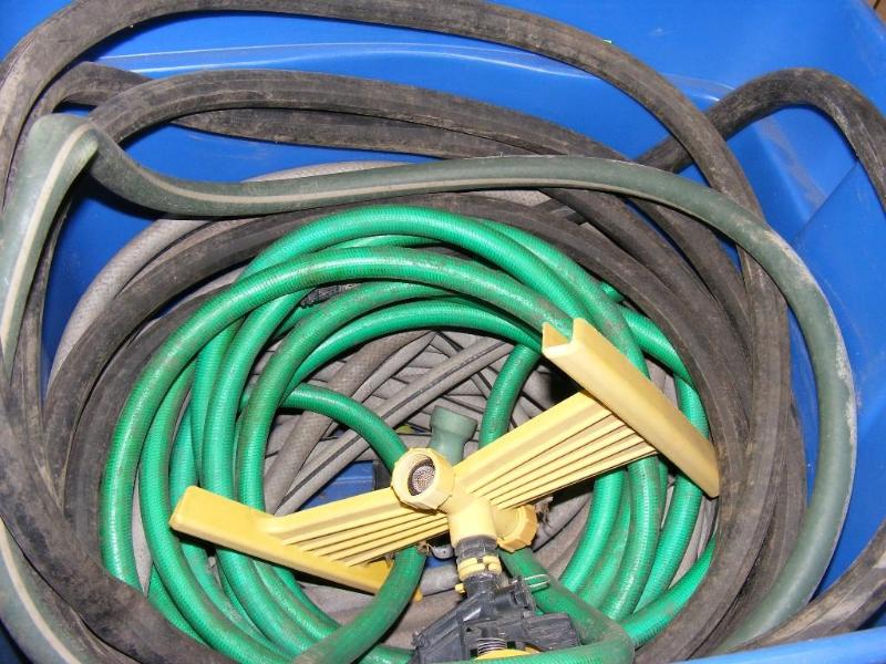 lot 78 image: Tub of Garden Hoses and sprinkler h...