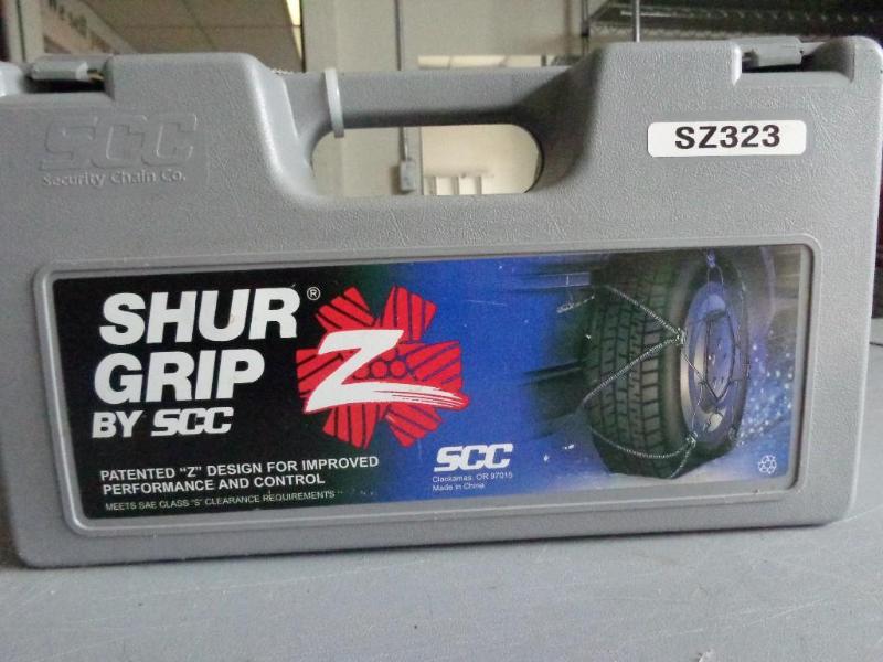 lot 21 image: Shur Grip tire chains SZ323.  ...