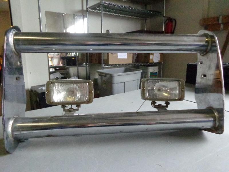 lot 25 image: Chrome brush guard with 2 lights....
