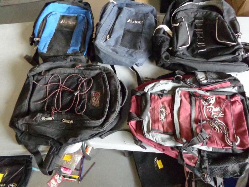lot 37 image: 5 backpacks.  Brands including...