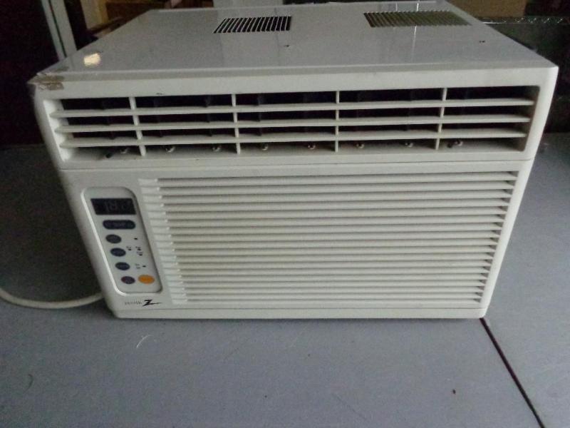 lot 5 image: Zenith 6,500 BTU window AC unit.&n...