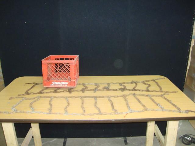 lot 41 image: Tire Chains in Prairie Farms Milk C...