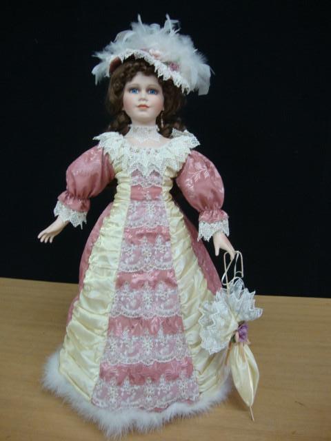 lot 74 image: 30in Porcelain Doll with Stand &...